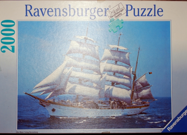 166329